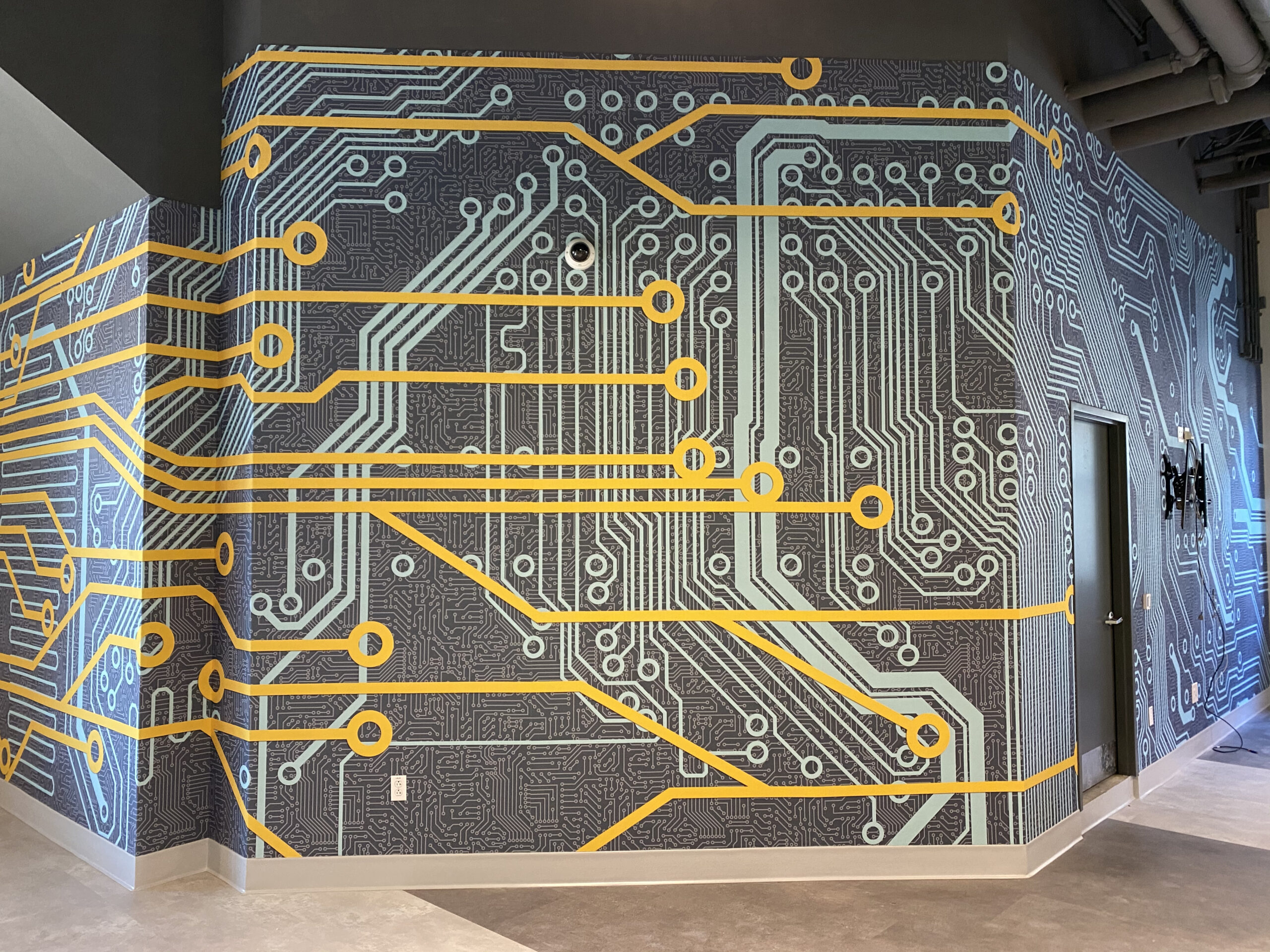 Professional Painters Inc wallpaper installation in Columbus OH living room accent wall